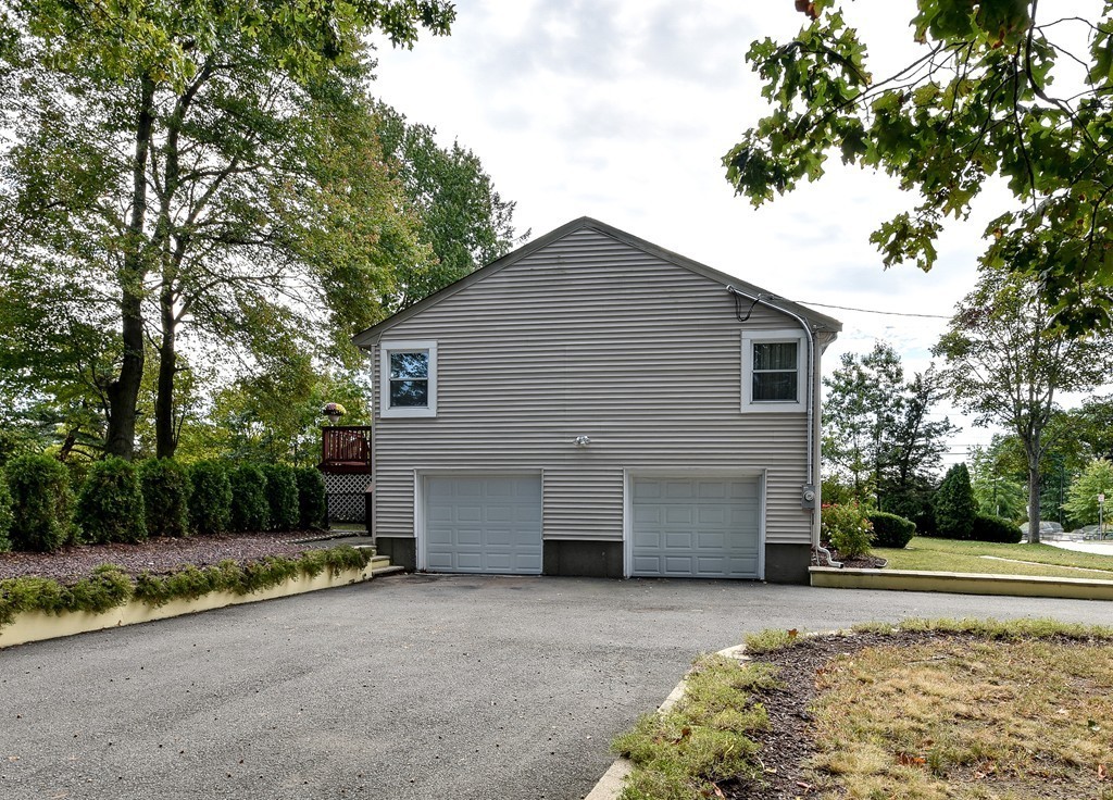 20 Rutledge Road Natick, MA 01760 - Photo 25 of 29 a view of a house with a yard
