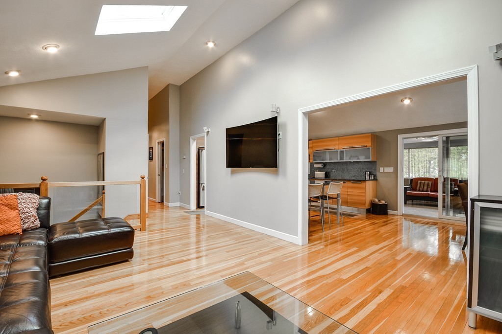 20 Rutledge Road Natick, MA 01760 - Photo 10 of 29 a living room with furniture and a flat screen tv