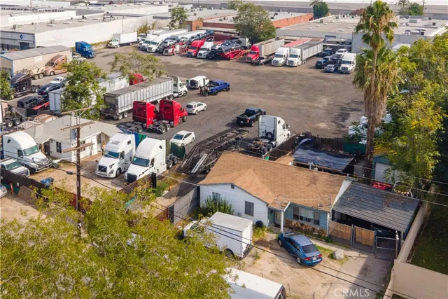 a terrace with outdoor seating and city view