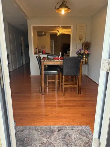 a view of entryway with wooden floor