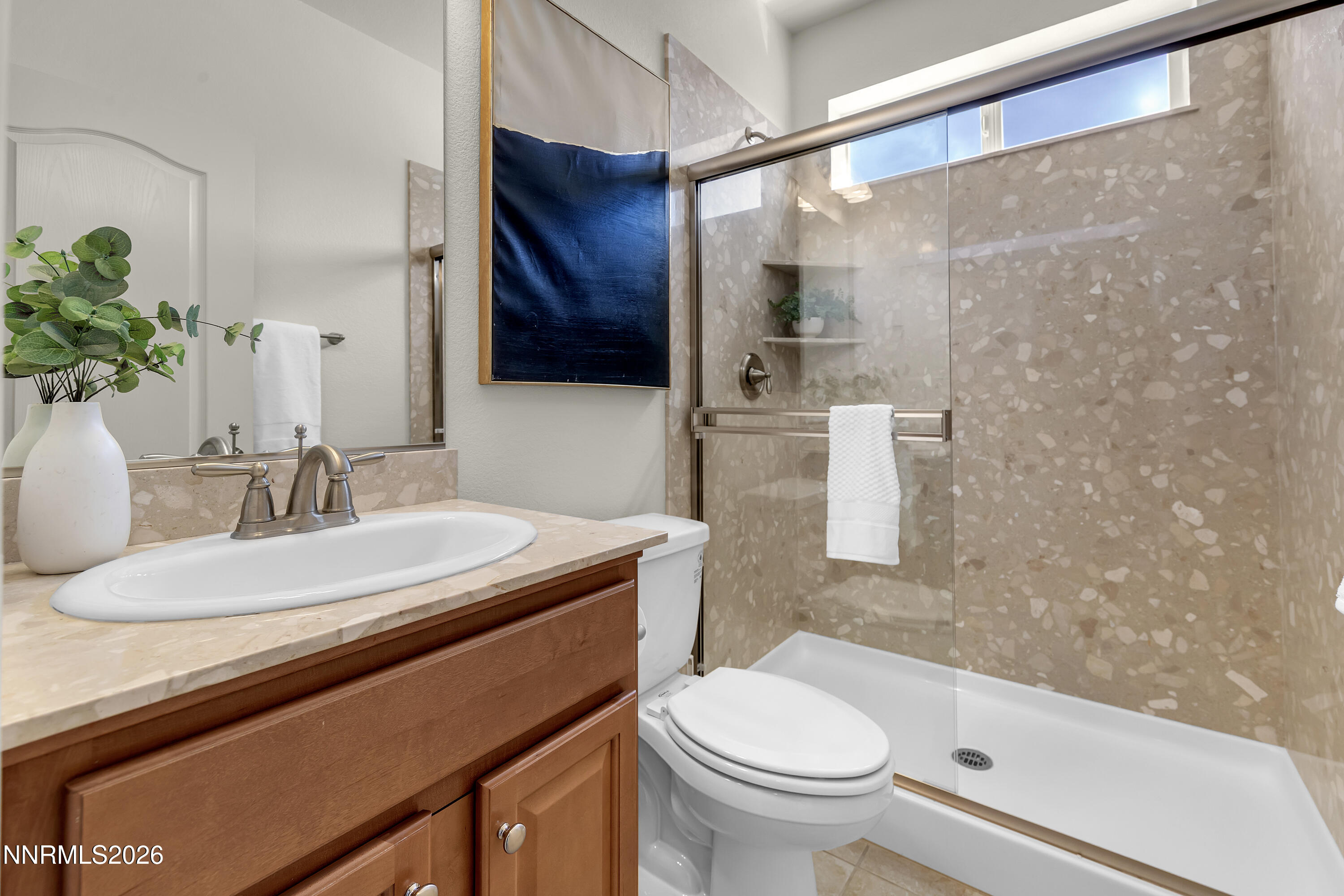 10150 Barrel Racer Drive Reno, NV 89521 - Photo 26 of 64 a bathroom with a sink a toilet and shower