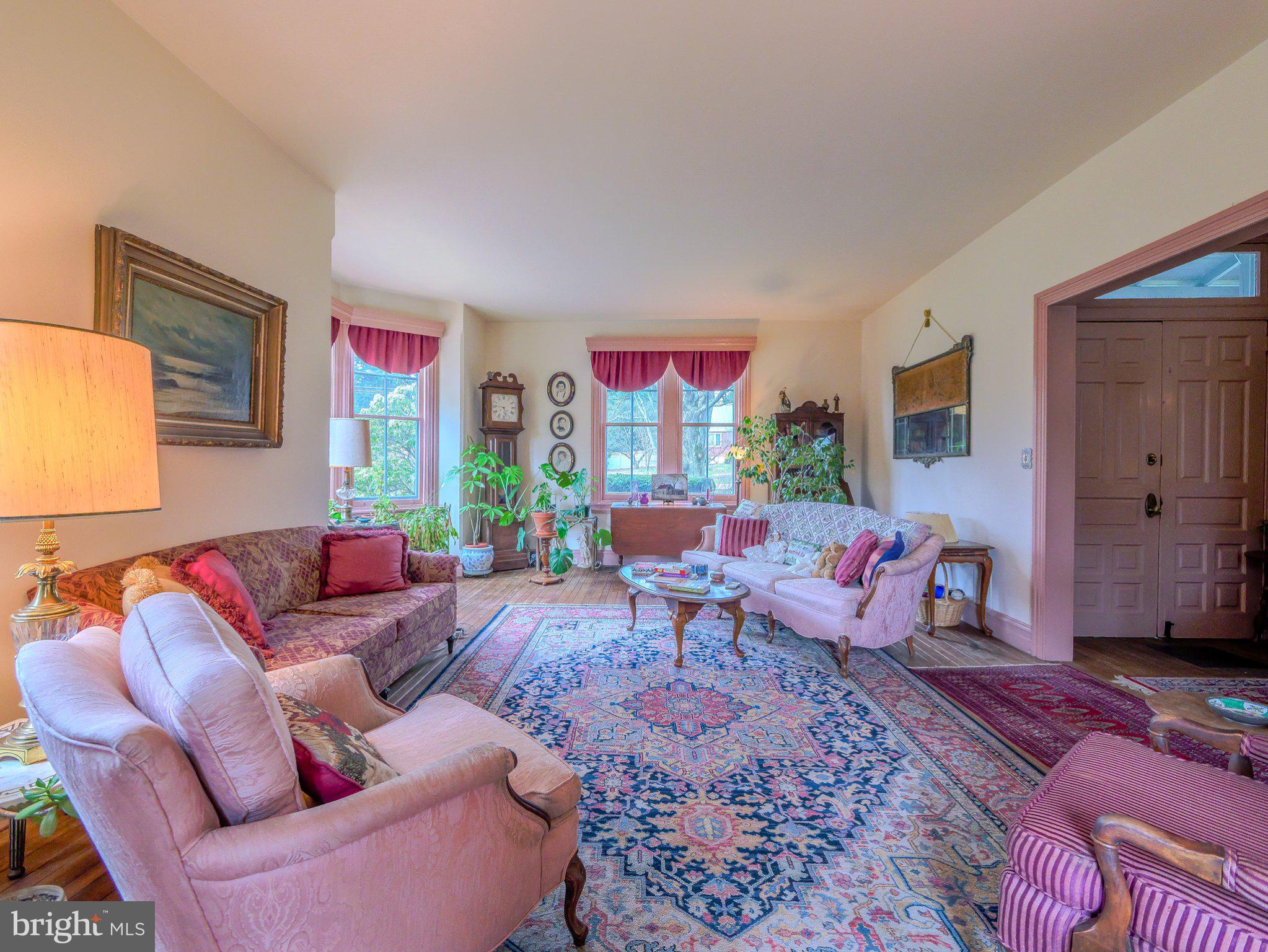 332 North Providence Road Wallingford, PA 19086 - Photo 11 of 48 a living room with furniture a rug and a window