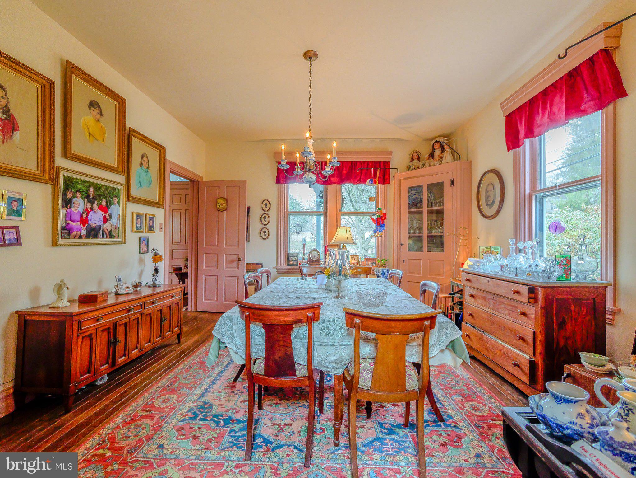 332 North Providence Road Wallingford, PA 19086 - Photo 14 of 48 a view of a dining room with furniture and chandelier