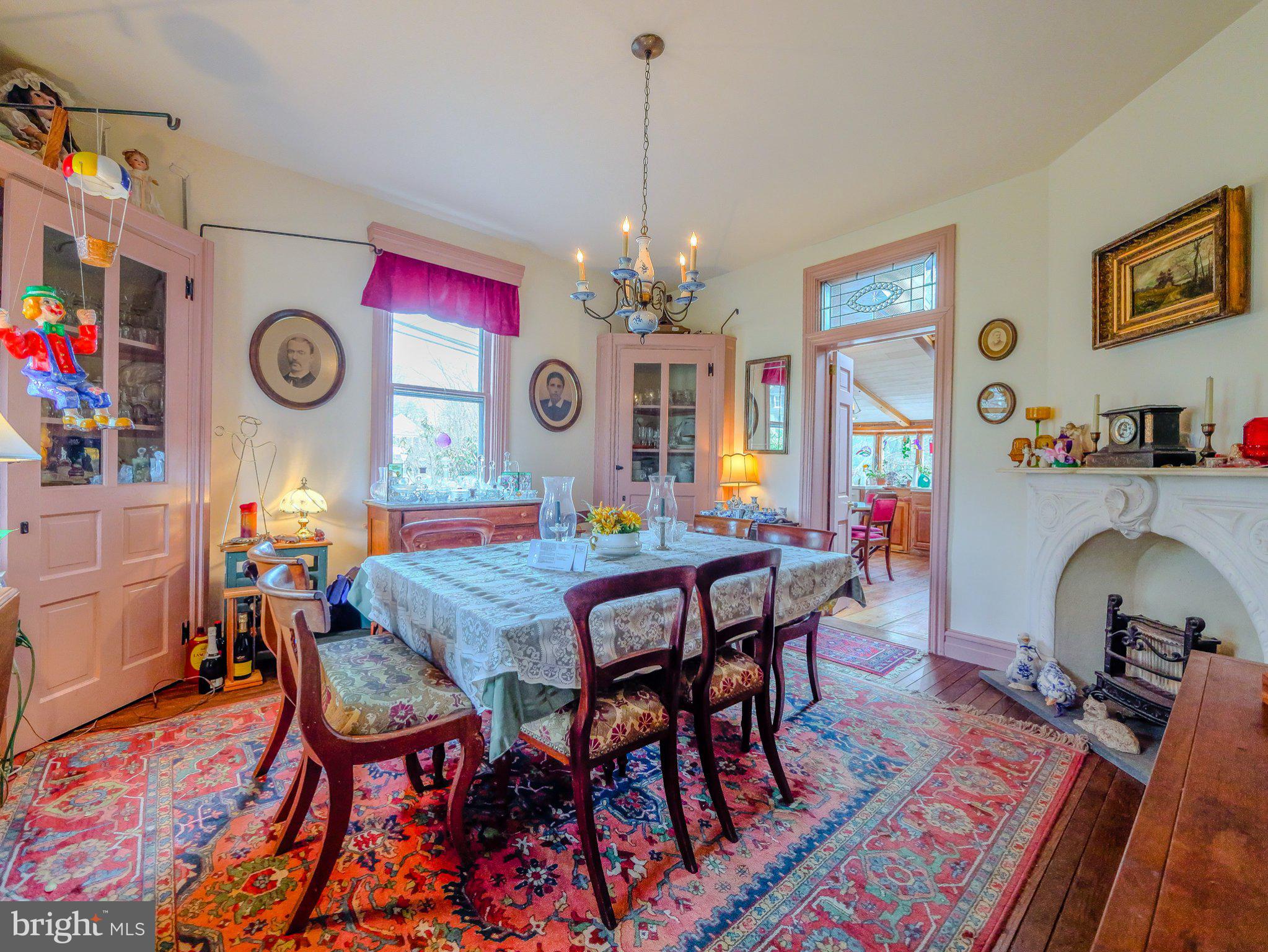 332 North Providence Road Wallingford, PA 19086 - Photo 16 of 48 a view of a dining room with furniture and a chandelier