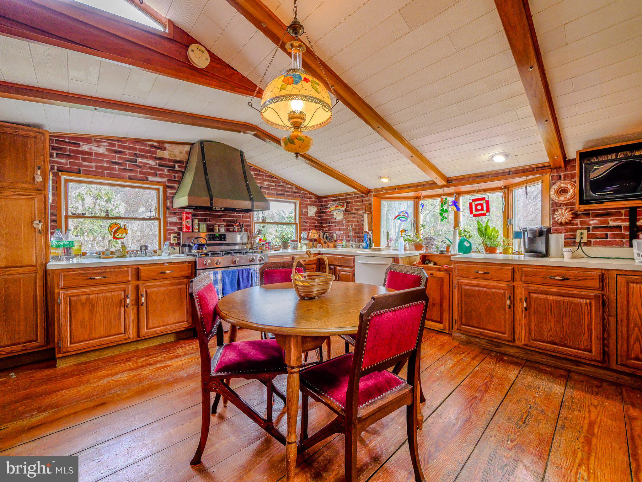 332 North Providence Road Wallingford, PA 19086 - Photo 17 of 48 a view of a dining room with furniture window and wooden floor