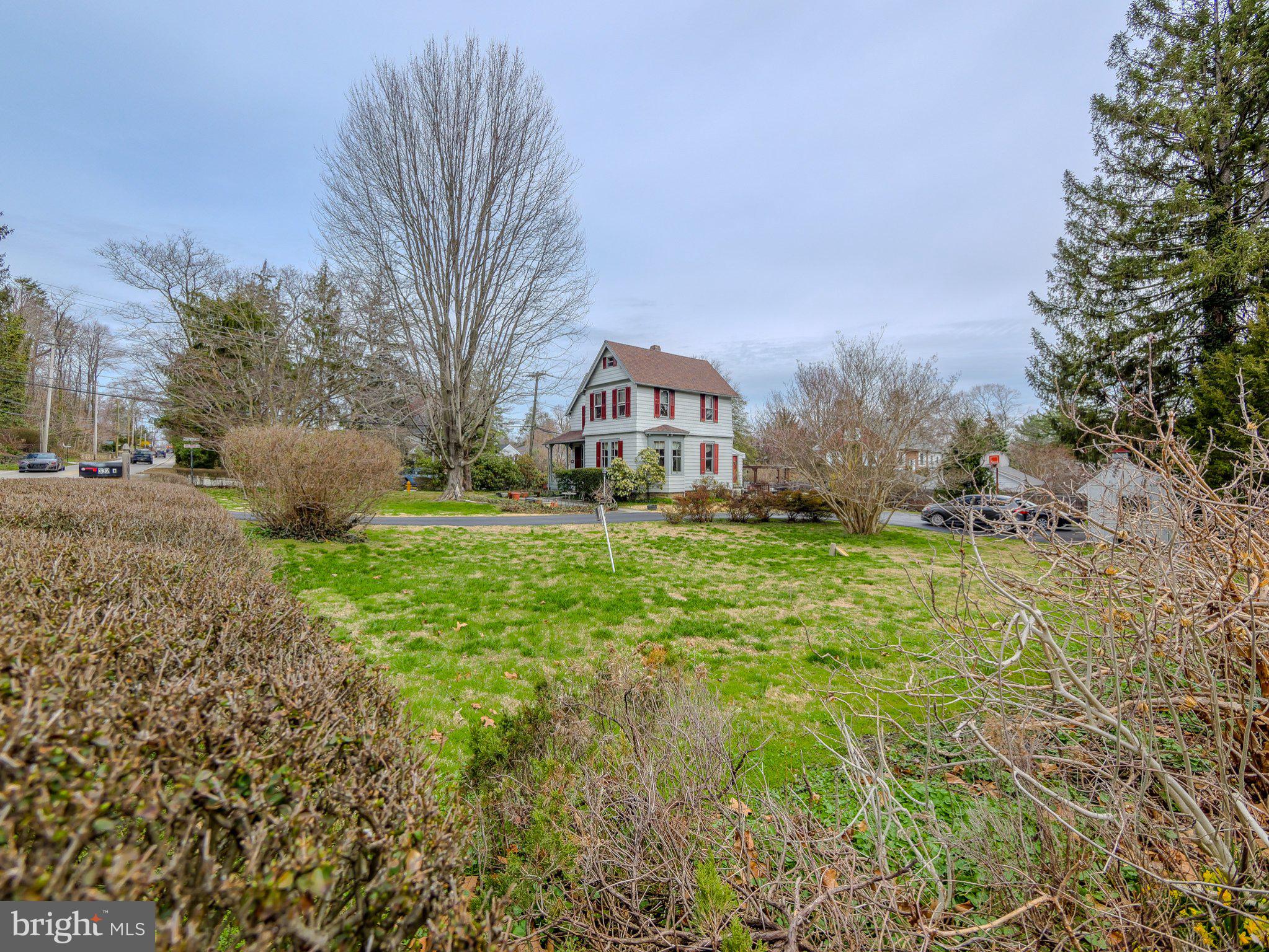 332 North Providence Road Wallingford, PA 19086 - Photo 2 of 48 a front view of a house with garden