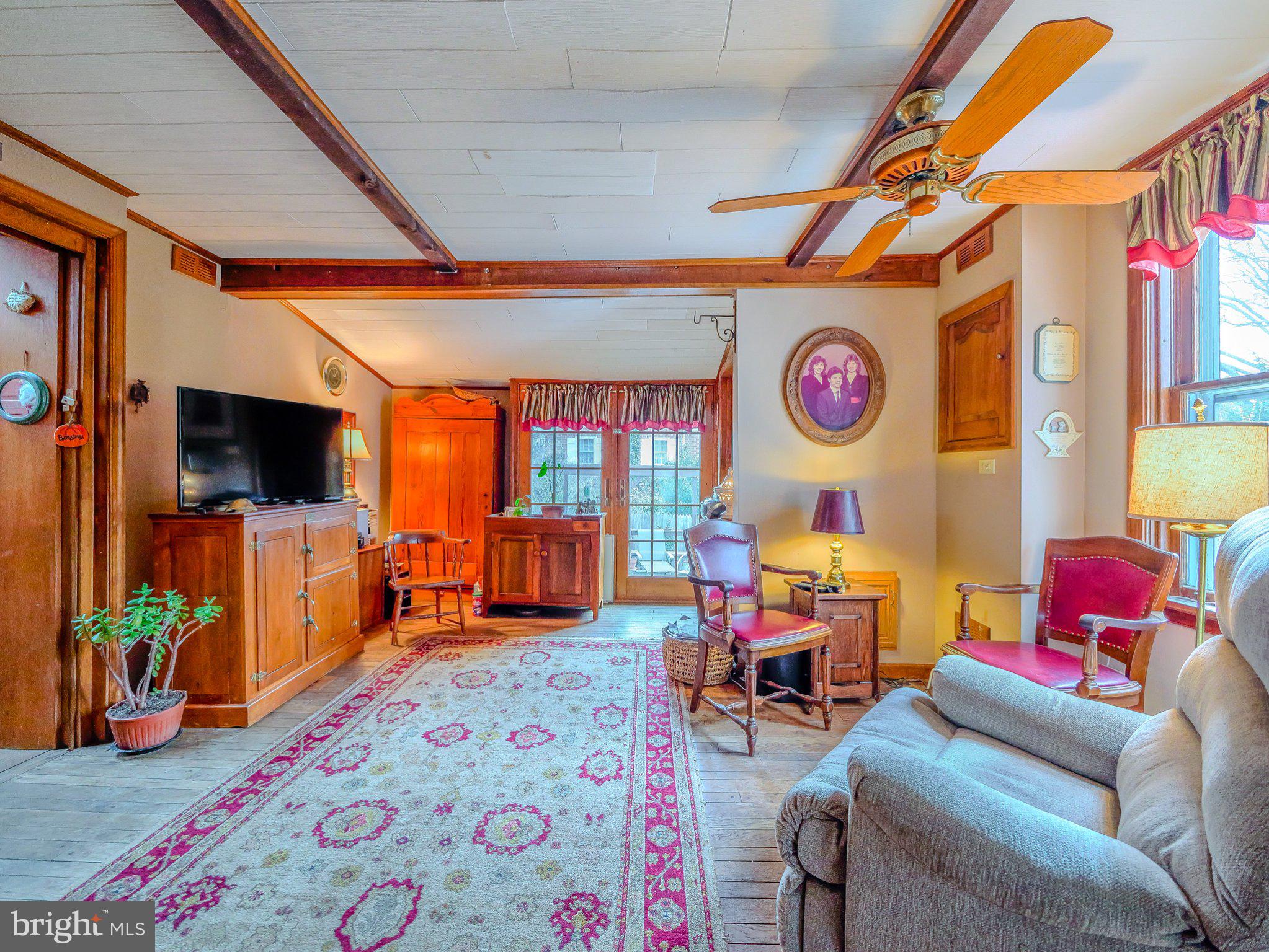 332 North Providence Road Wallingford, PA 19086 - Photo 21 of 48 a living room with furniture and a flat screen tv