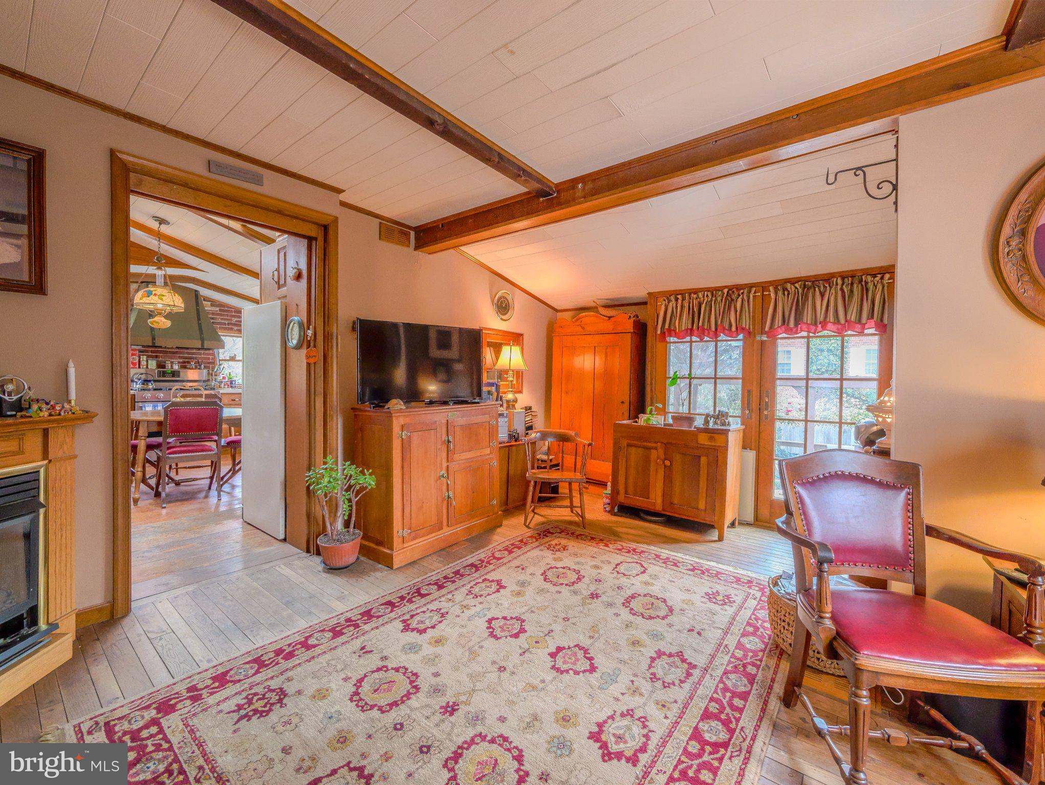 332 North Providence Road Wallingford, PA 19086 - Photo 22 of 48 a bedroom with furniture and a flat screen tv