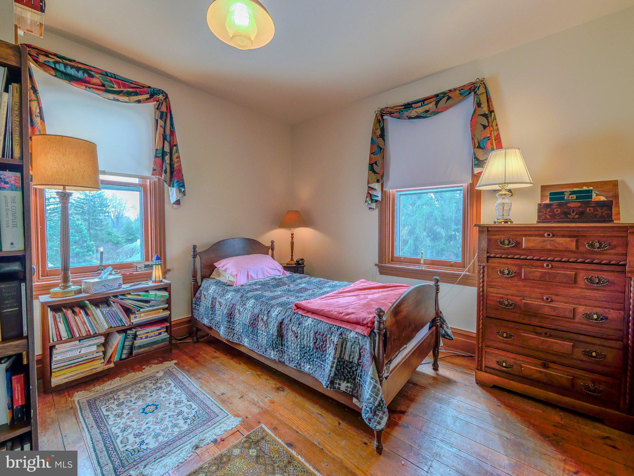 332 North Providence Road Wallingford, PA 19086 - Photo 29 of 48 a bedroom with a bed and a window