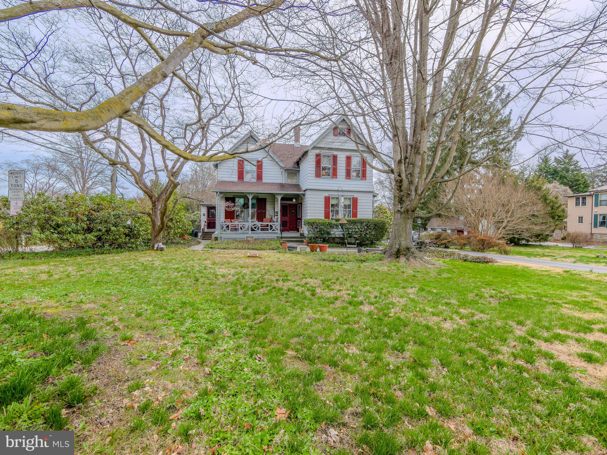 332 North Providence Road Wallingford, PA 19086 - Photo 3 of 48 a front view of a house with garden