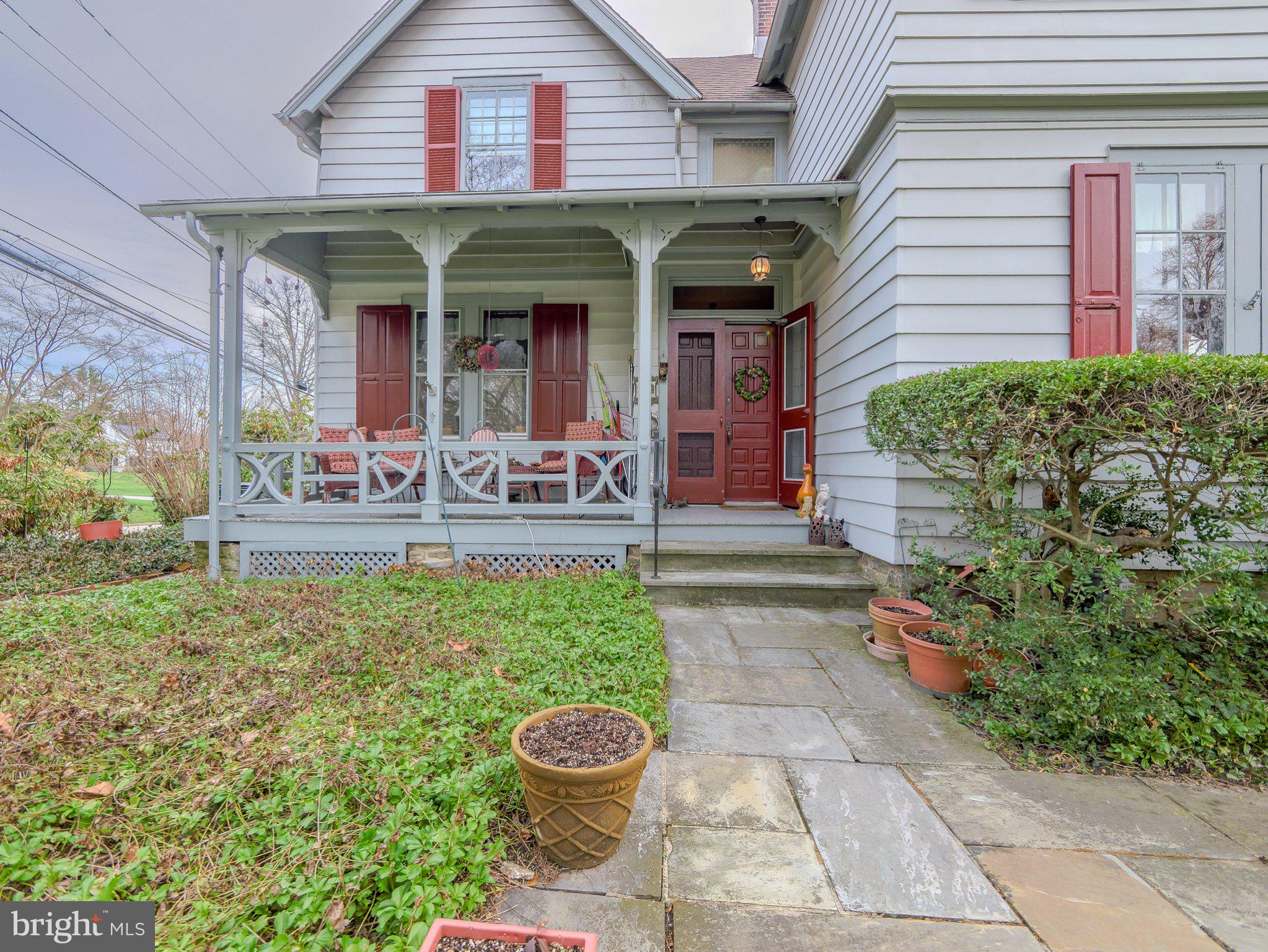 332 North Providence Road Wallingford, PA 19086 - Photo 4 of 48 a front view of a house with garden