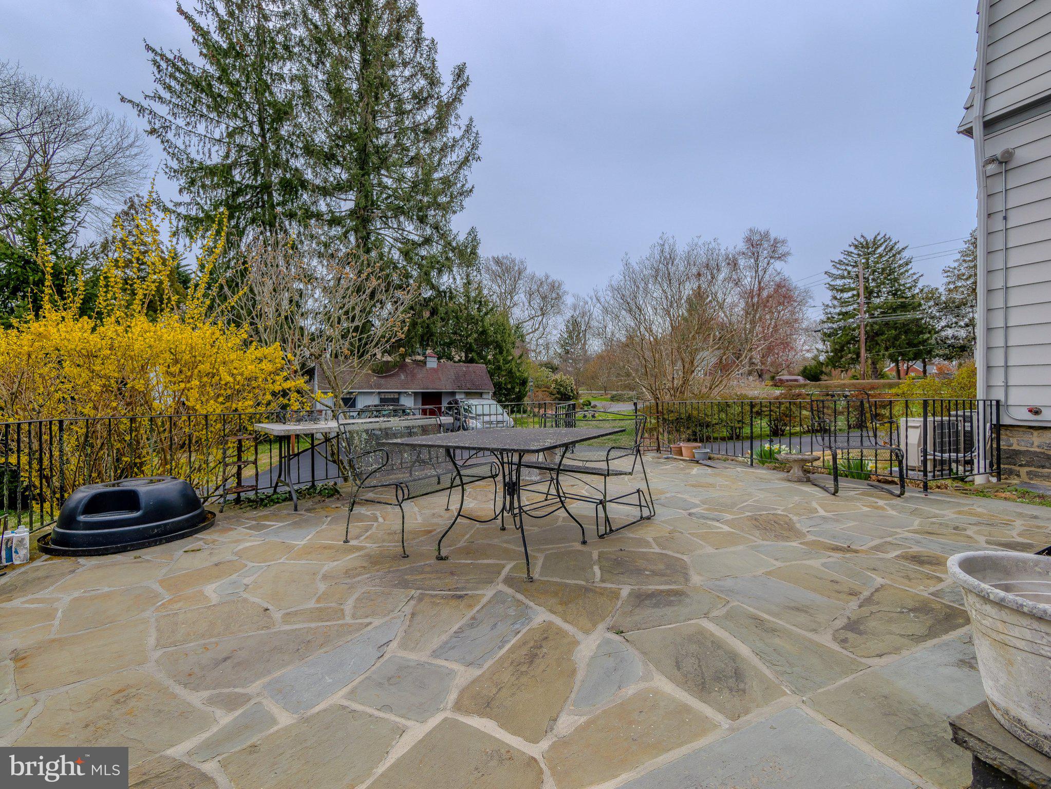 332 North Providence Road Wallingford, PA 19086 - Photo 43 of 48 a view of a yard with furniture and a fire pit
