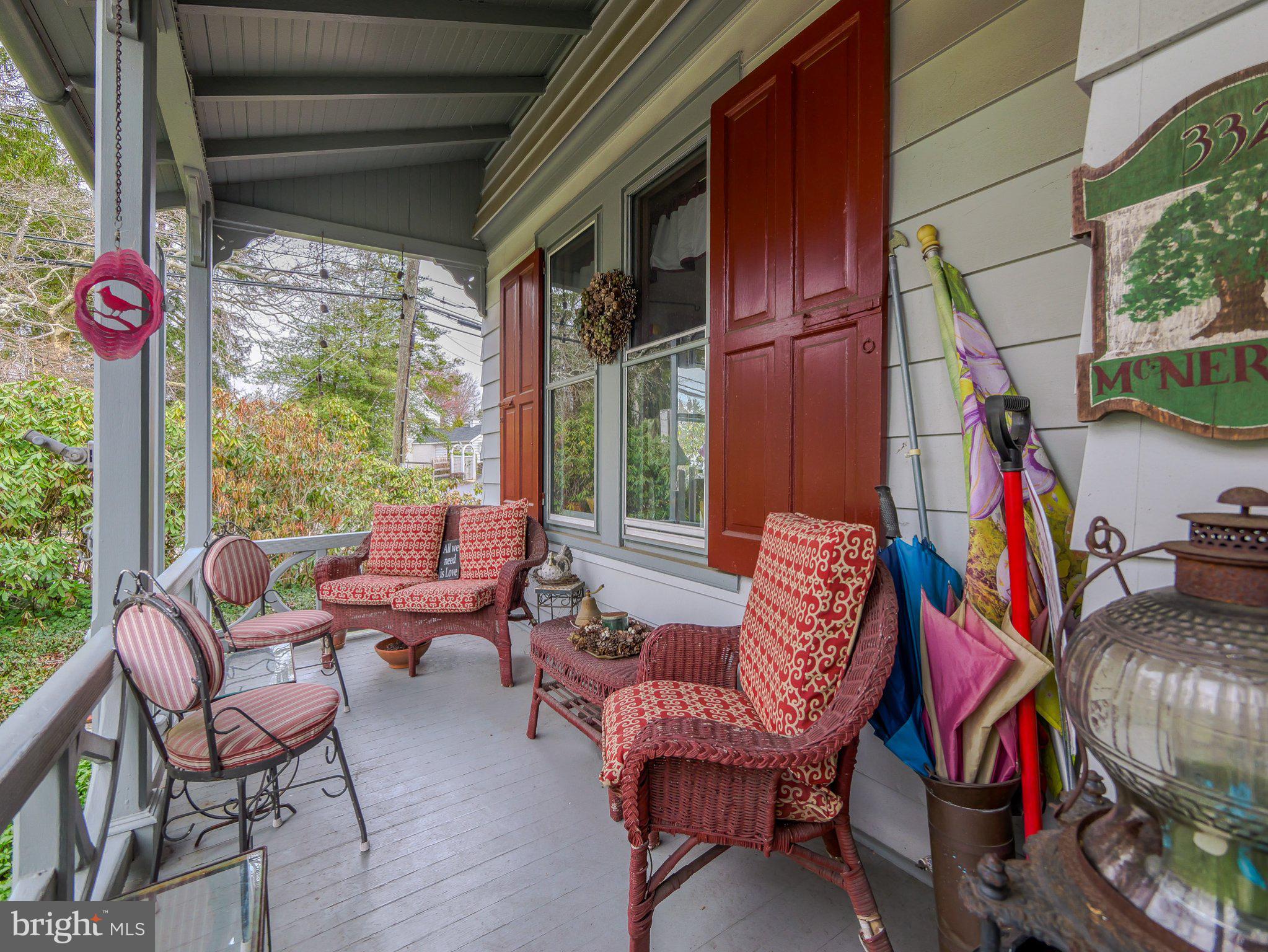332 North Providence Road Wallingford, PA 19086 - Photo 7 of 48 a outdoor living space with furniture and a potted plant