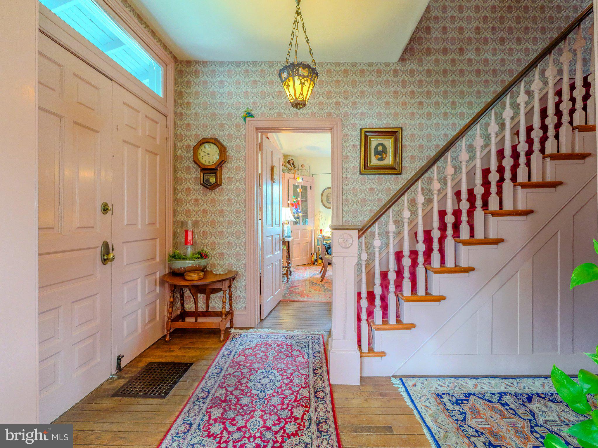 332 North Providence Road Wallingford, PA 19086 - Photo 9 of 48 a view of entryway and hall with wooden floor