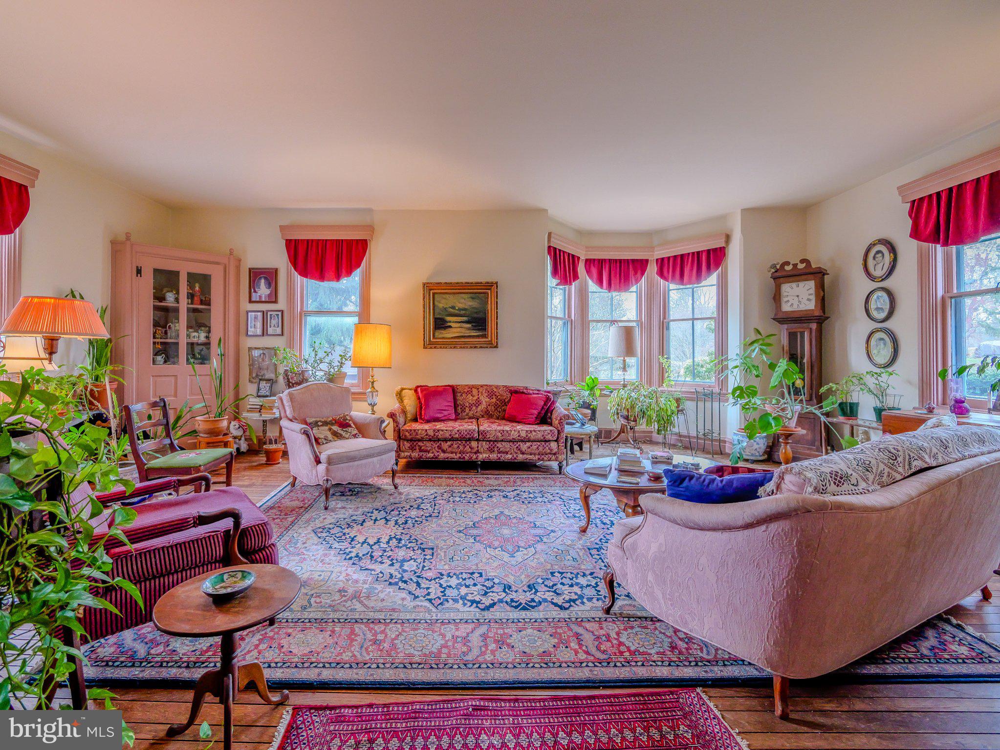 332 North Providence Road Wallingford, PA 19086 - Photo 10 of 48 a living room with furniture and a potted plant