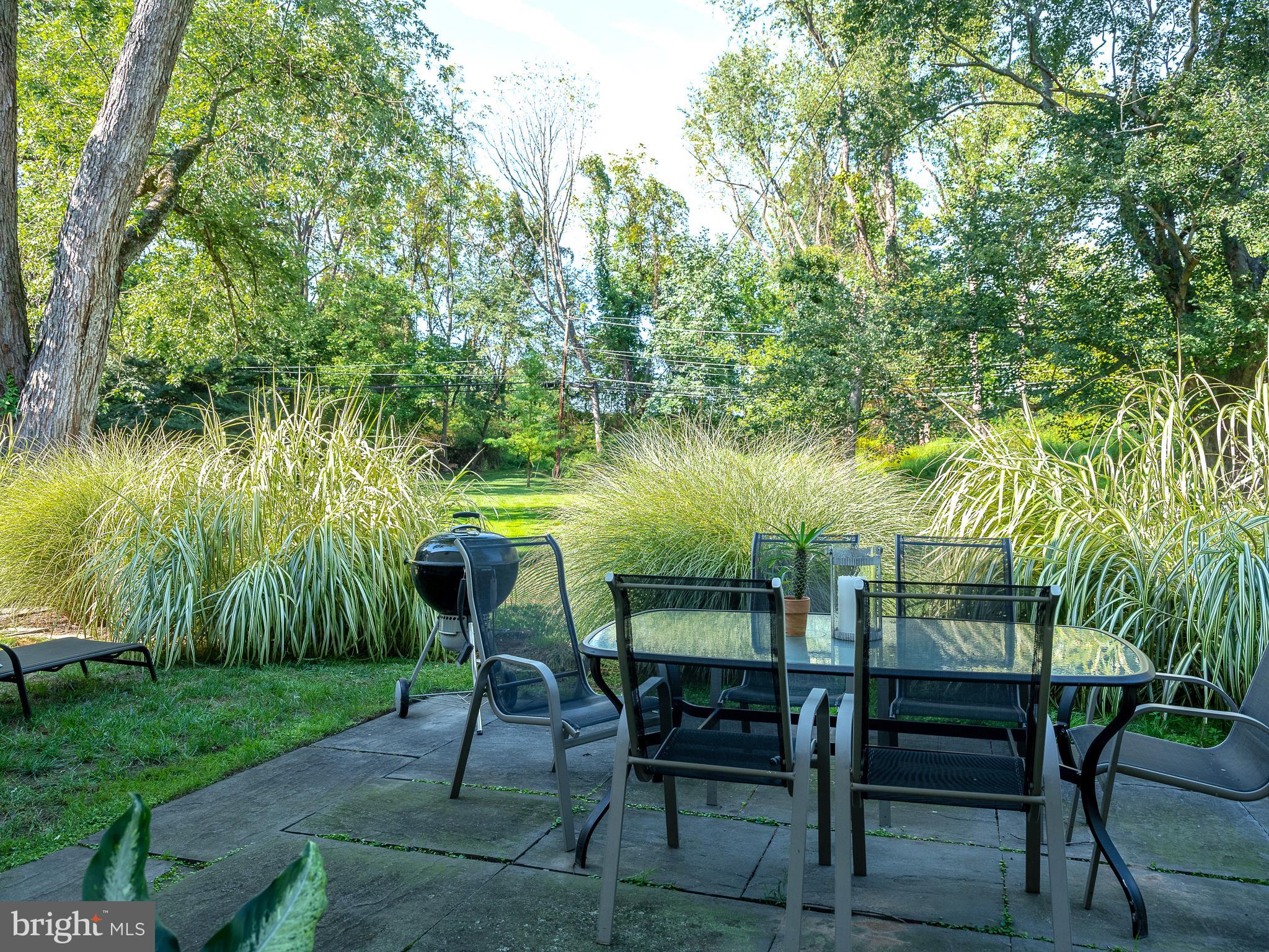 333 Green Valley Road Langhorne, PA 19047 - Photo 36 of 41 Bluestone patio, landscaped for privacy