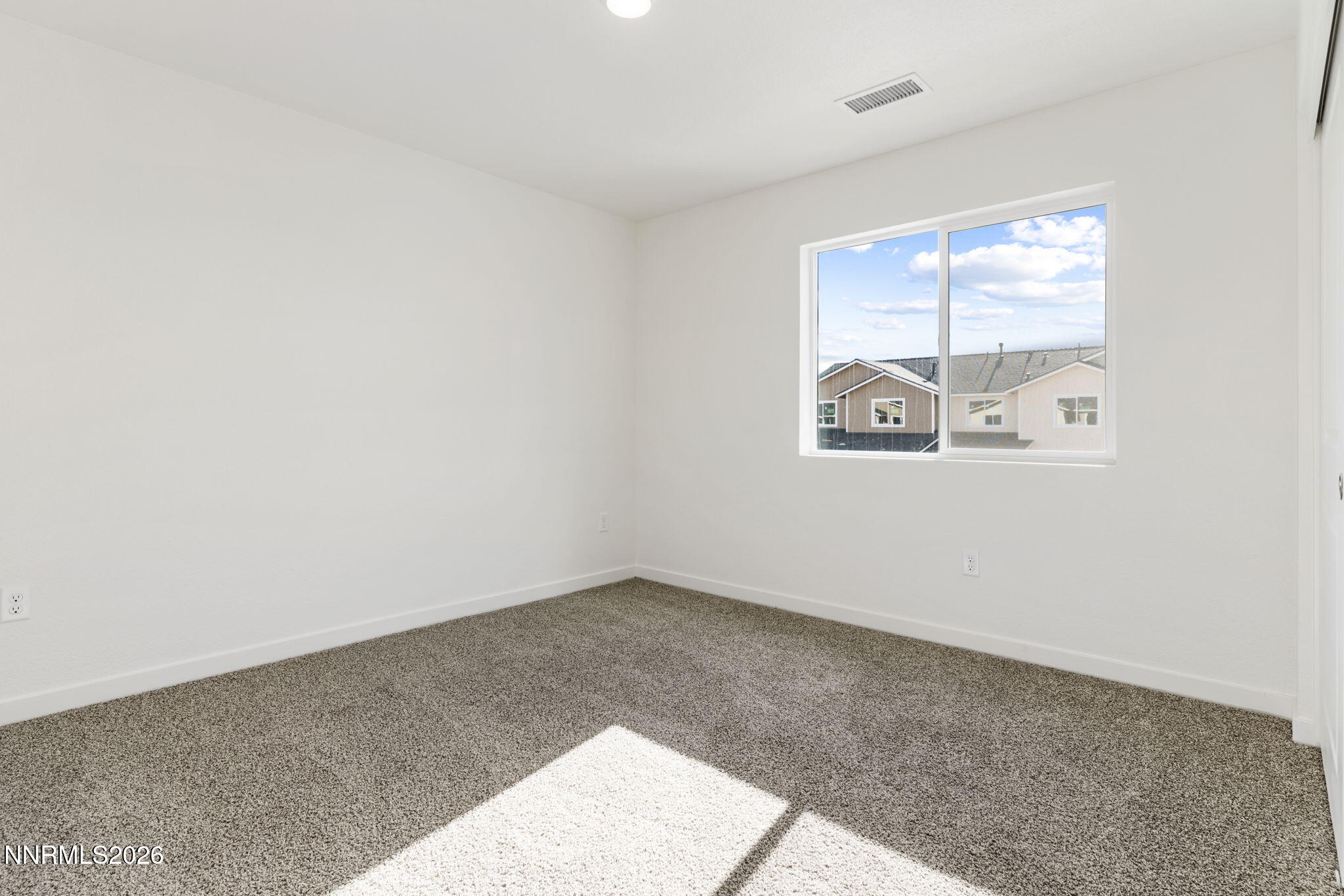 357 Halite Drive Dayton, NV 89403 - Photo 12 of 20 an empty room with windows