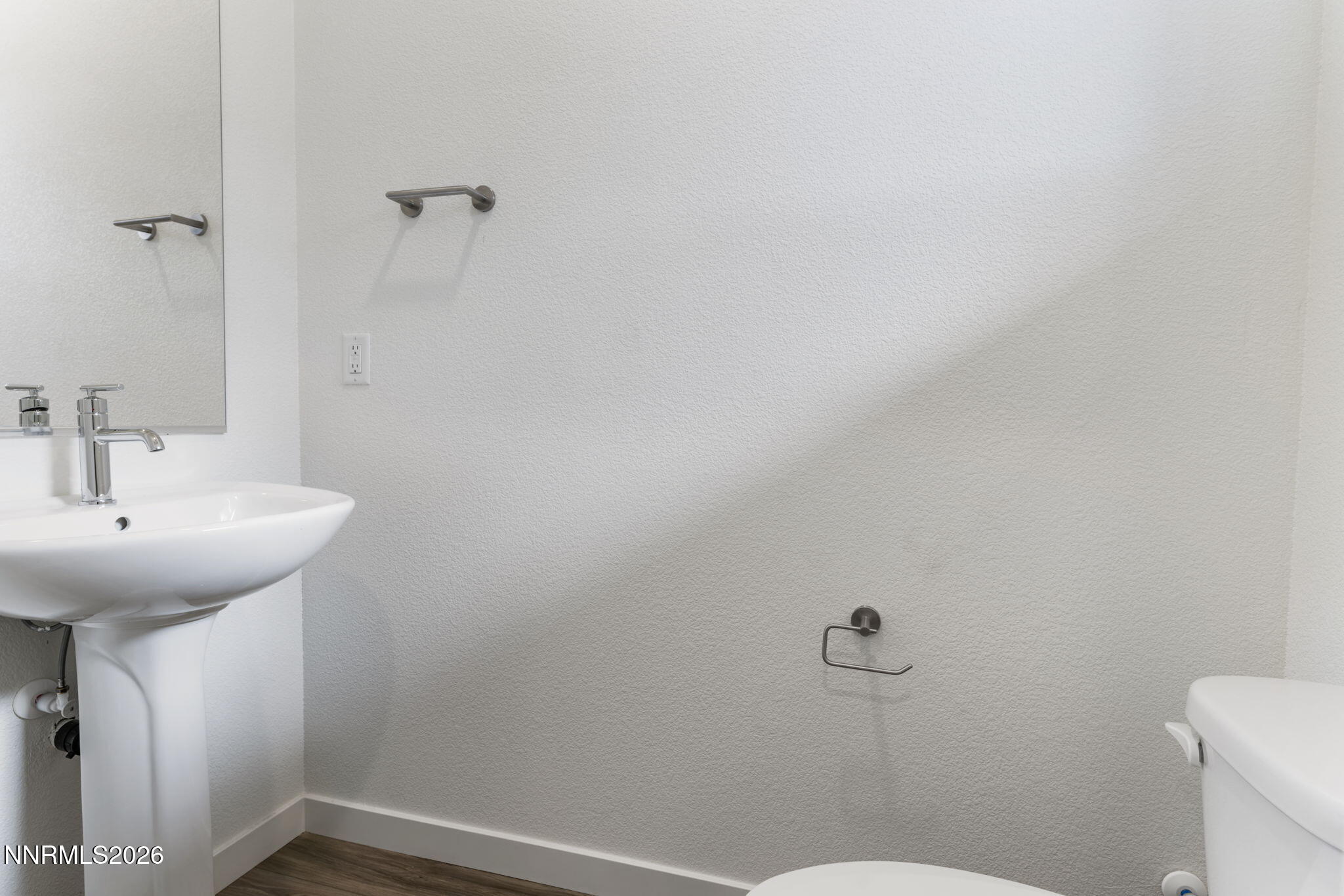 357 Halite Drive Dayton, NV 89403 - Photo 4 of 20 a bathroom with a sink and mirror