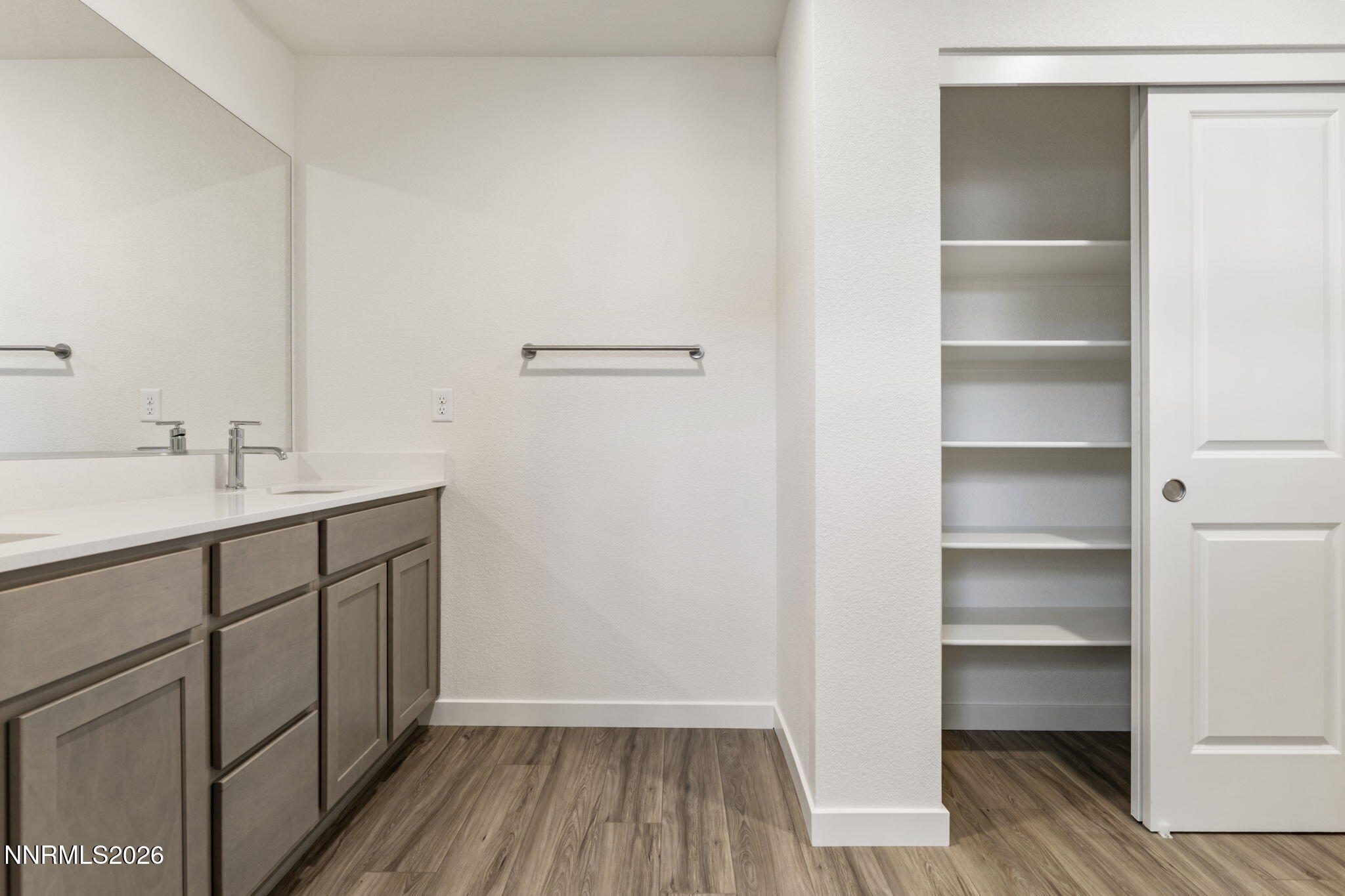 357 Halite Drive Dayton, NV 89403 - Photo 9 of 20 a bathroom with a sink and a mirror