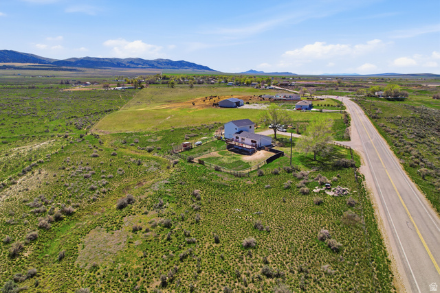 830 North Stone Road Snowville, UT 84336 - Photo 41 of 69 Overview of rural landscape featuring a mountain backdrop