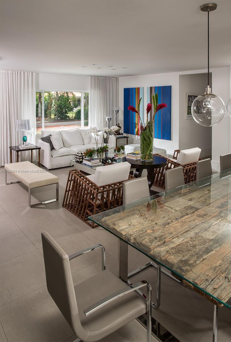 Morningside Miami, FL 33137 - Photo 12 of 29 a living room with patio furniture and a potted plant