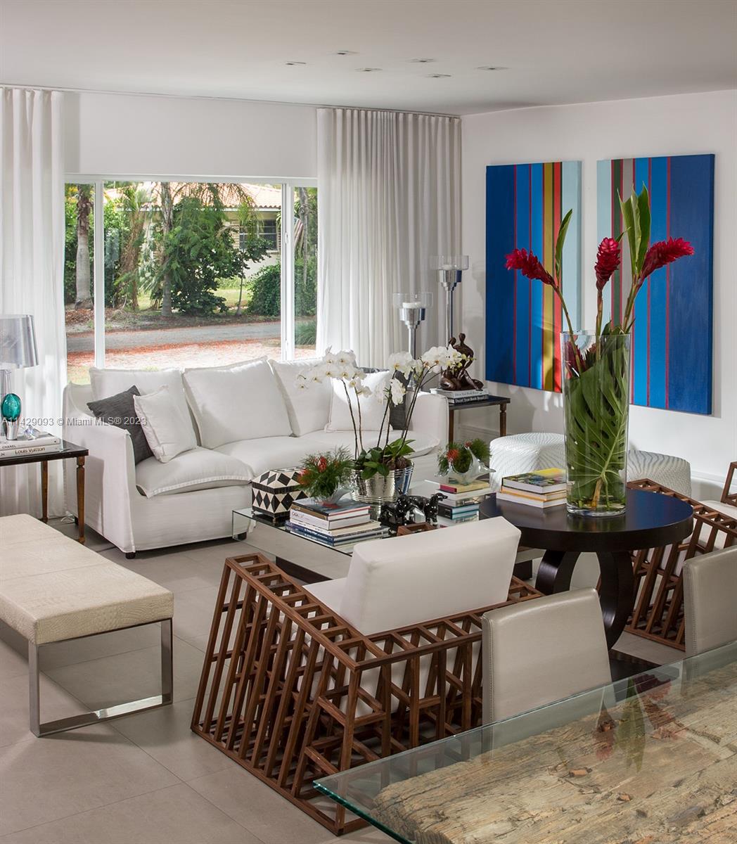 Morningside Miami, FL 33137 - Photo 13 of 29 a living room with furniture and a large window