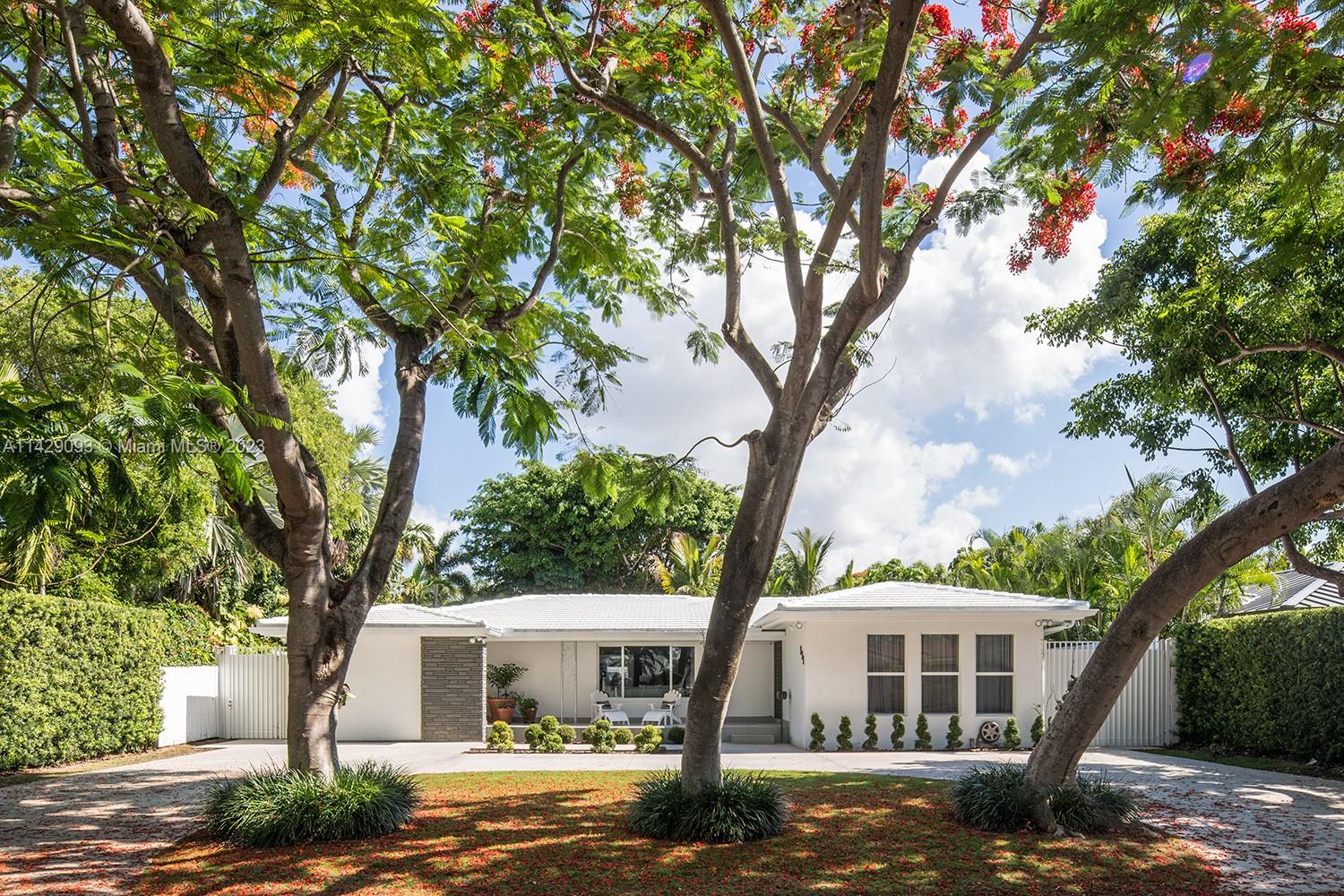 Morningside Miami, FL 33137 - Photo 29 of 29 a front view of a house with garden
