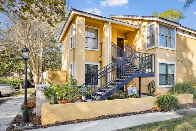 a view of a building with a street