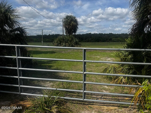 0 Tymber Creek Road Ormond Beach, FL 32174 - Photo 7 of 8 a view of a yard with wooden fence