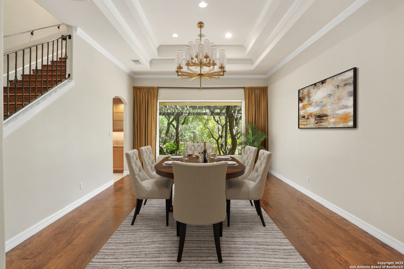 24630 Bogey Ridge San Antonio, TX 78260 - Photo 14 of 50 a dining room with chandelier and wooden floor