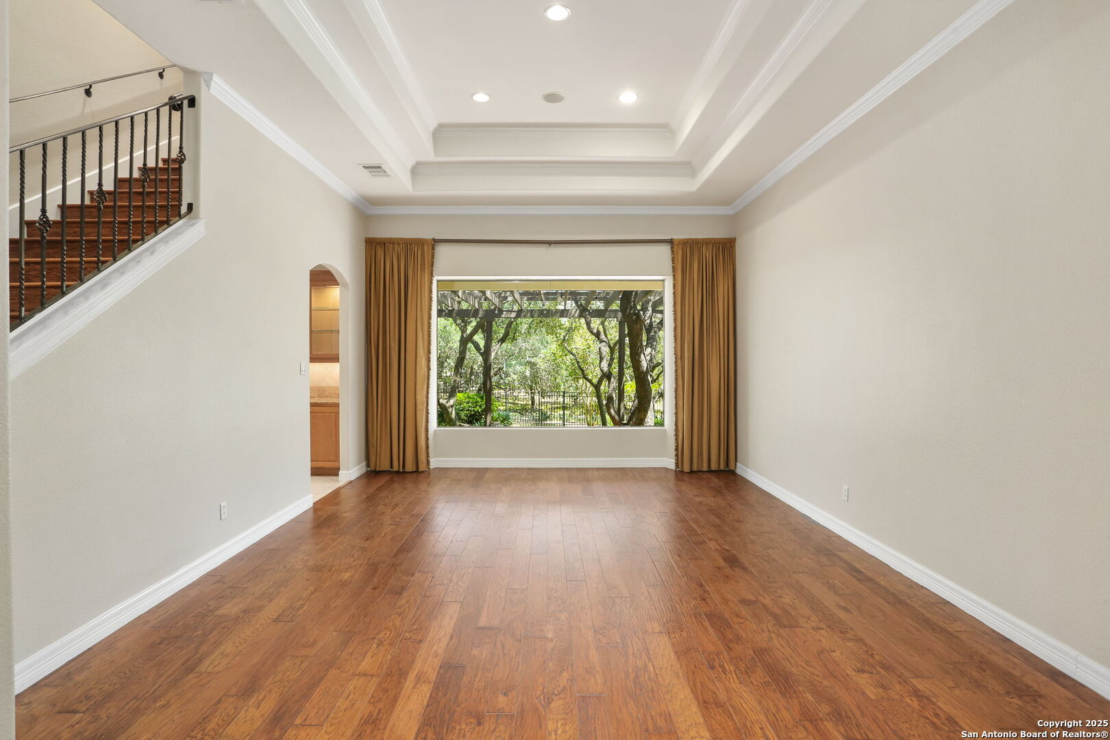 24630 Bogey Ridge San Antonio, TX 78260 - Photo 16 of 50 wooden floor in an empty room with a window
