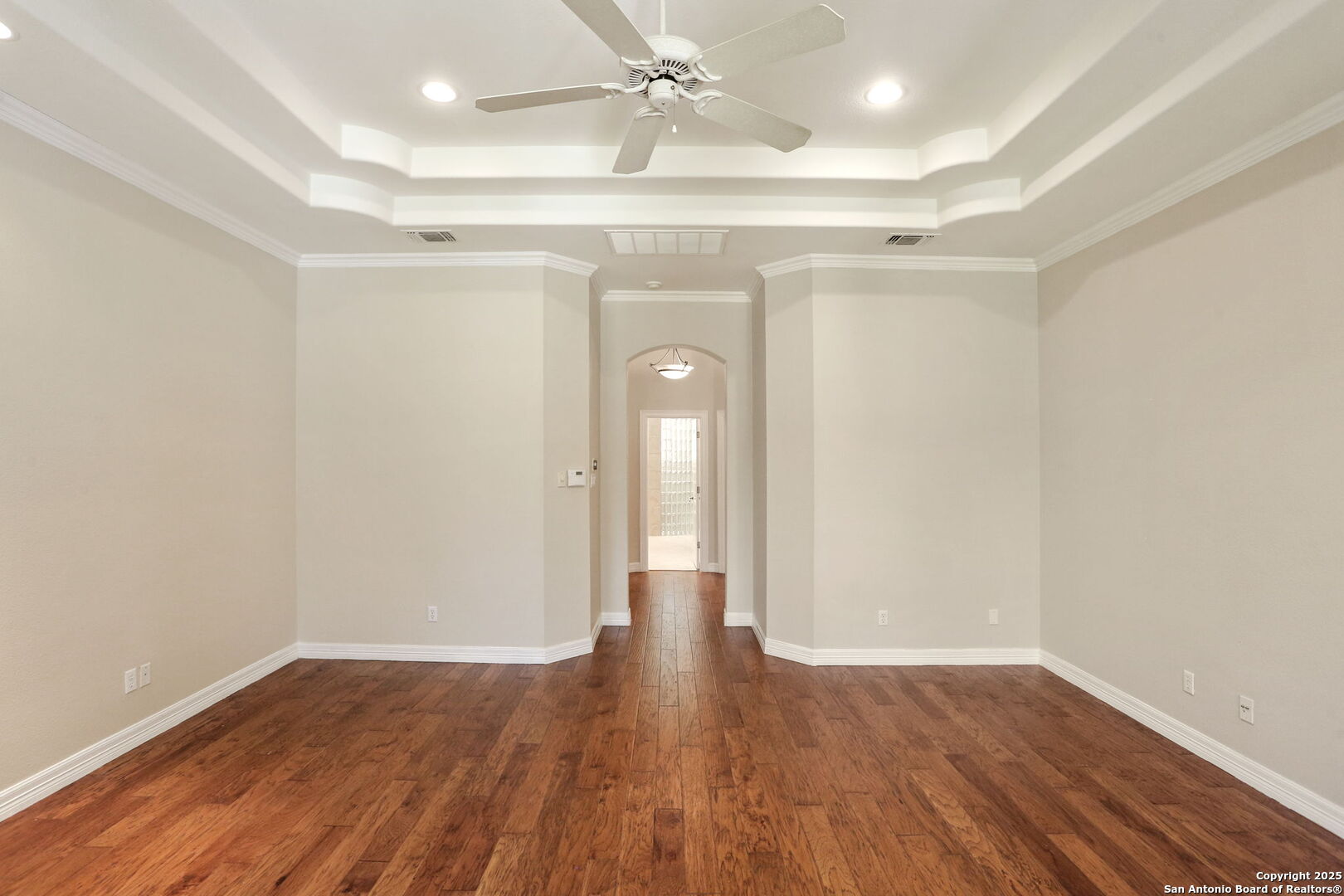 24630 Bogey Ridge San Antonio, TX 78260 - Photo 33 of 50 wooden floor in an empty room with a window