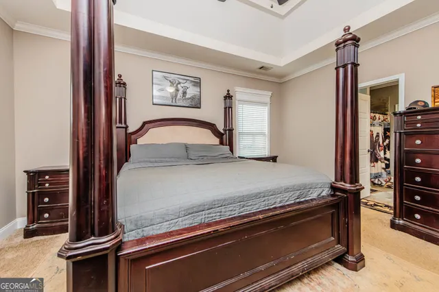 a kitchen with stainless steel appliances granite countertop a sink refrigerator and cabinets