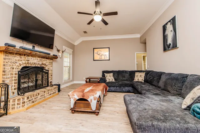 a view of a patio with table and chairs