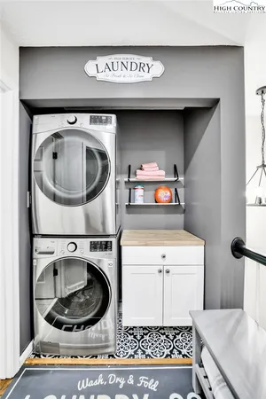 a utility room with dryer and washer