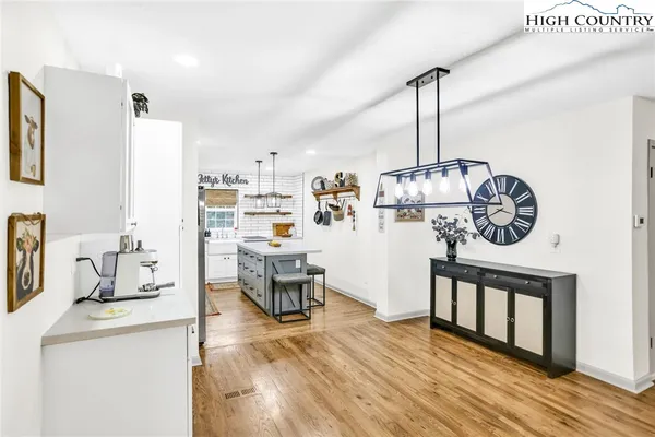 a view of dining room with wooden floor