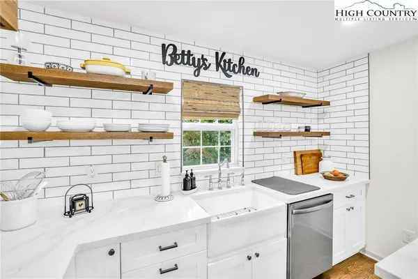 a bathroom with a sink and a stove