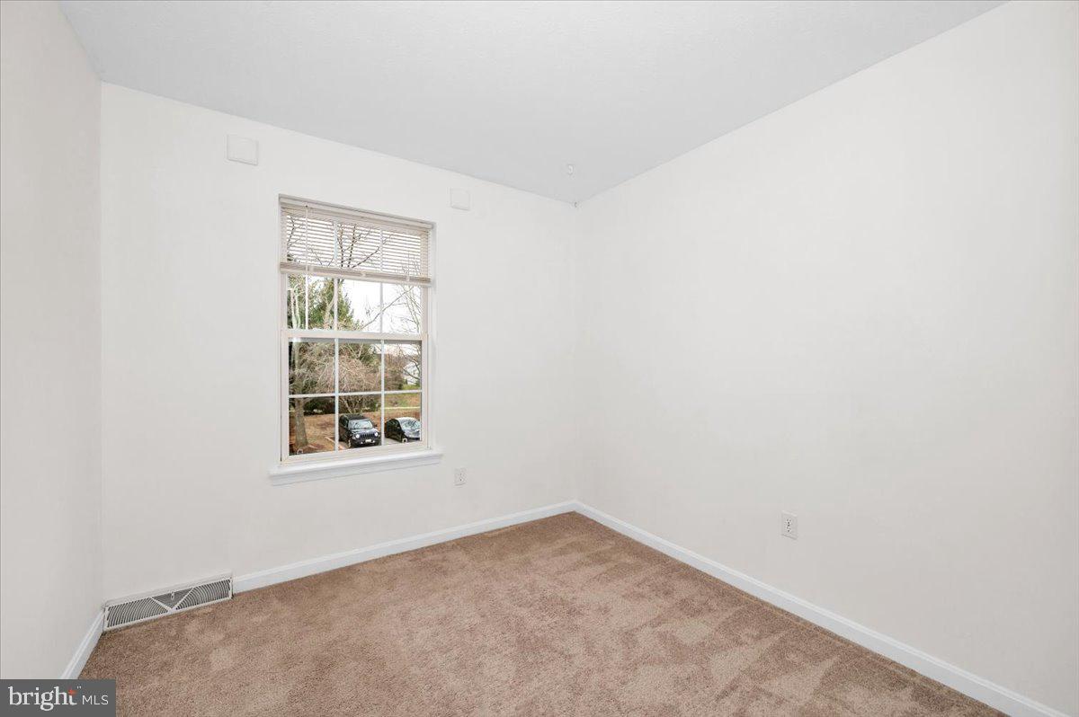 1184 Heathfield Road Sykesville, MD 21784 - Photo 22 of 56 an empty room with a window