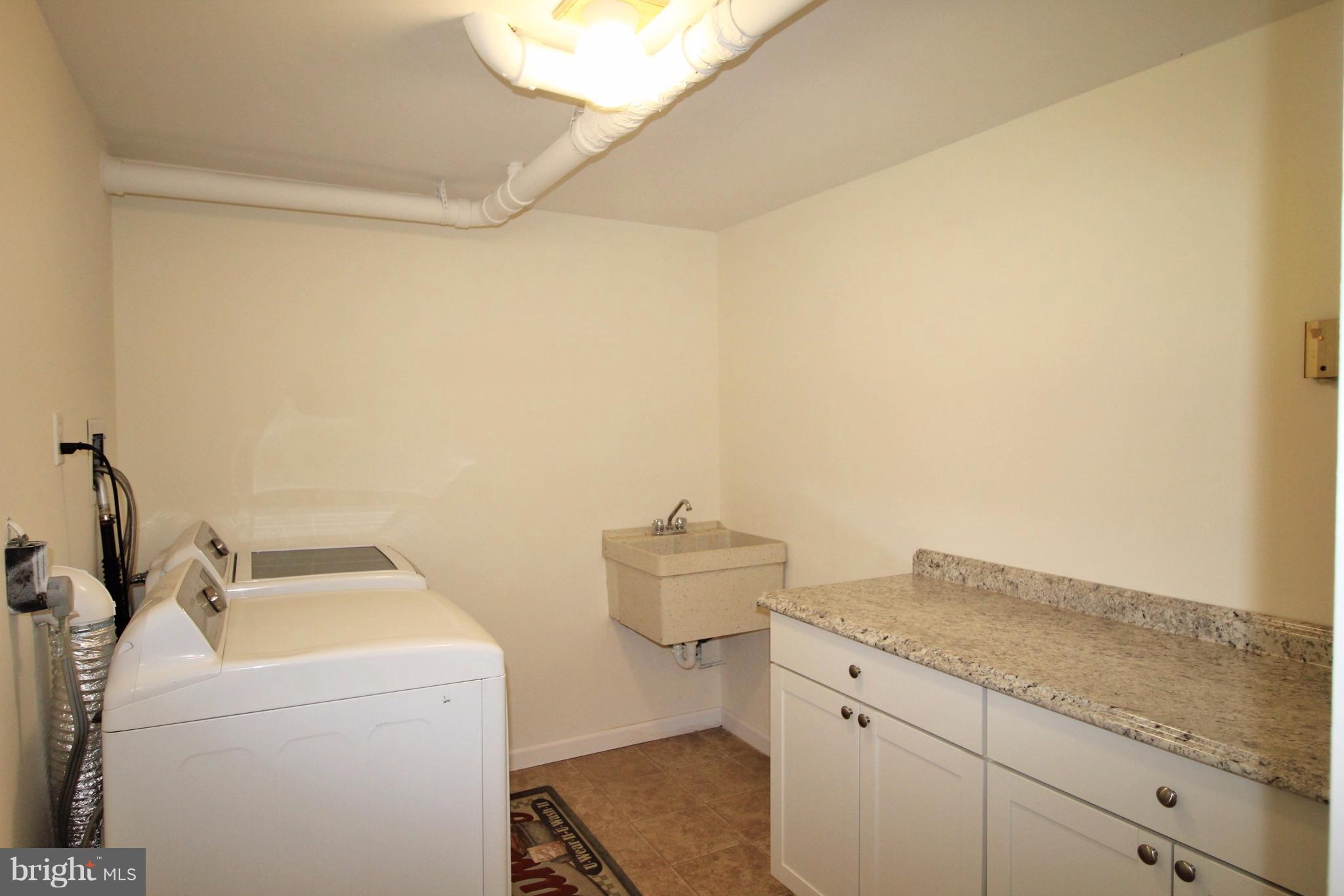 12919 Old Annapolis Road Mount Airy, MD 21771 - Photo 27 of 30 a utility room with dryer and washer