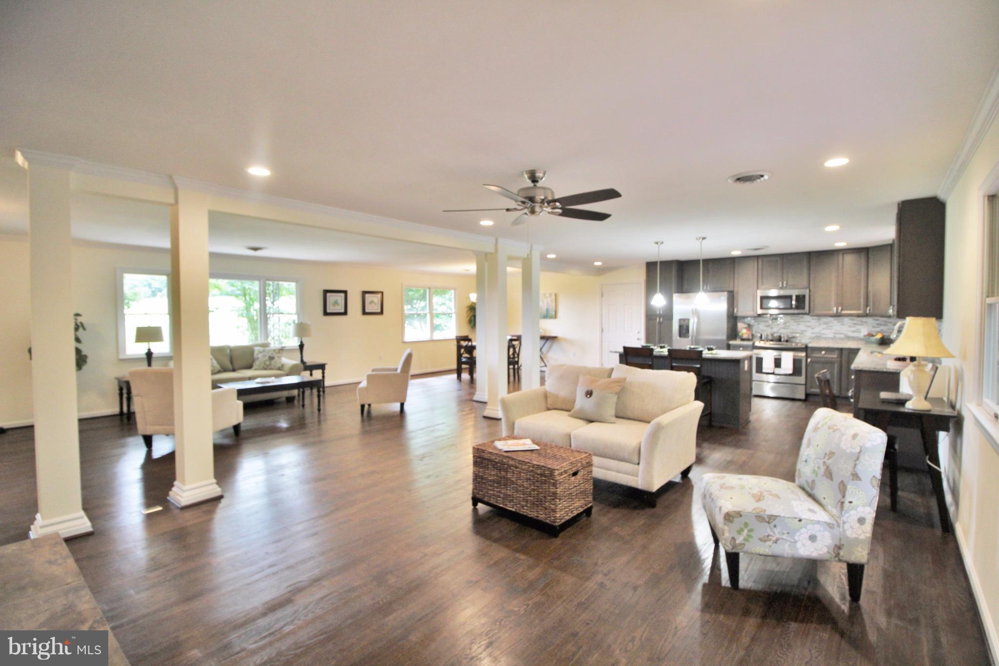 12919 Old Annapolis Road Mount Airy, MD 21771 - Photo 4 of 30 a living room with furniture and wooden floor