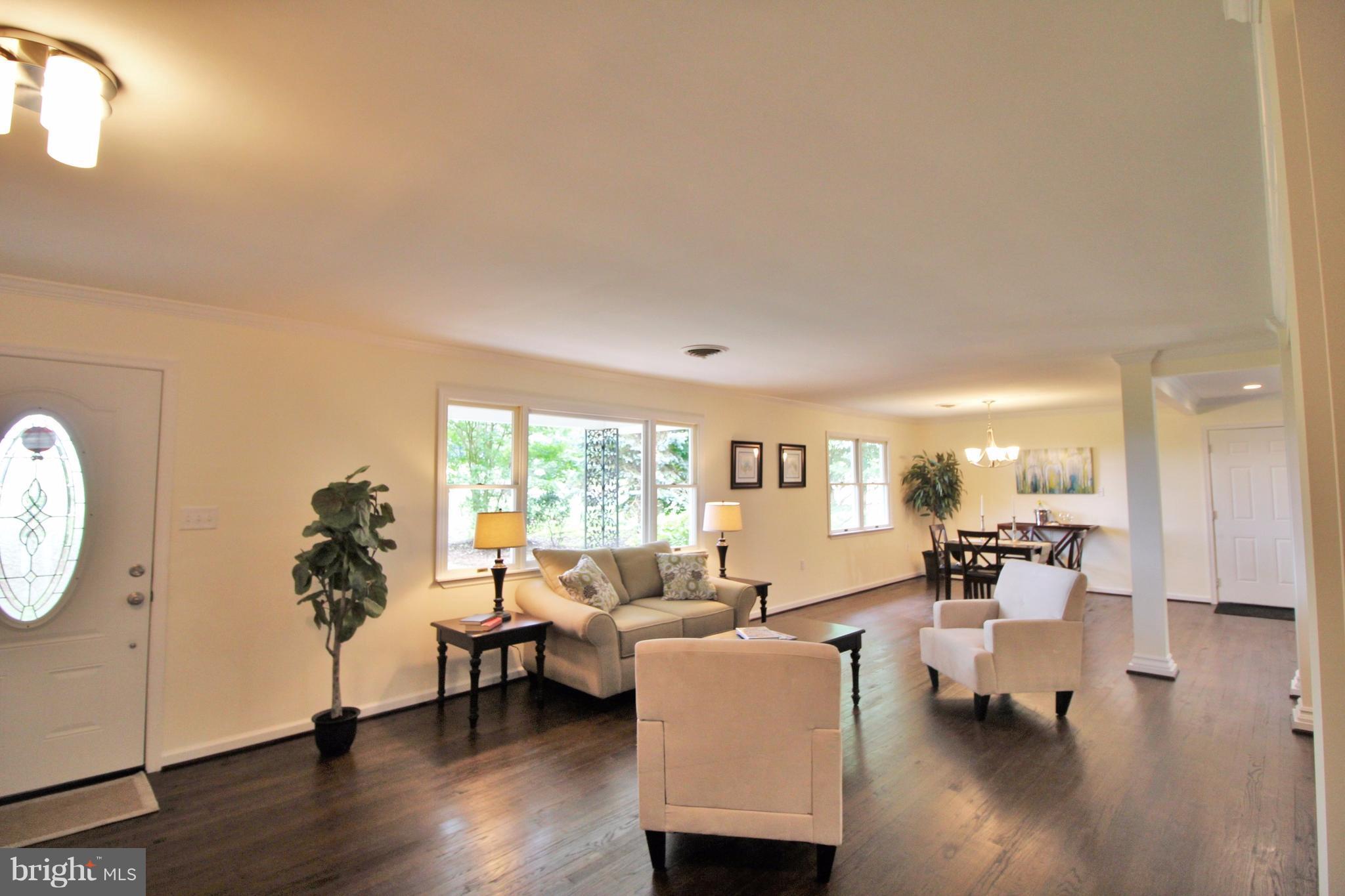 12919 Old Annapolis Road Mount Airy, MD 21771 - Photo 7 of 30 a living room with furniture and a large window