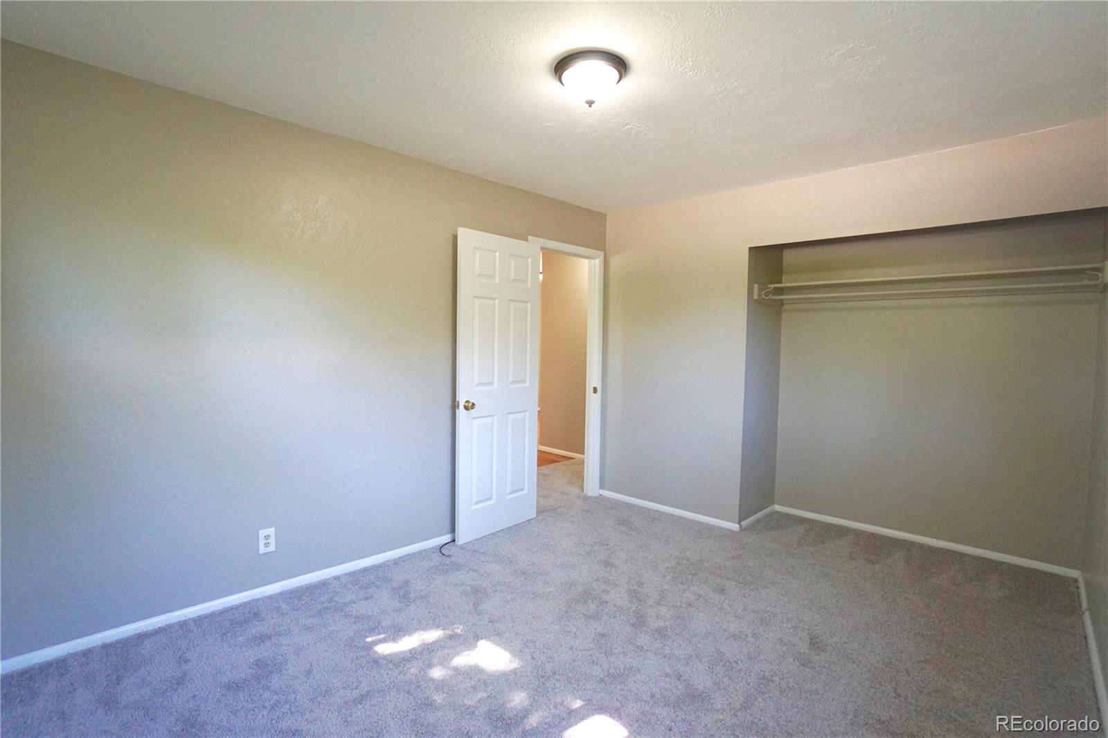 2519 15th Avenue Greeley, CO 80631 - Photo 13 of 25 an empty room with closet area