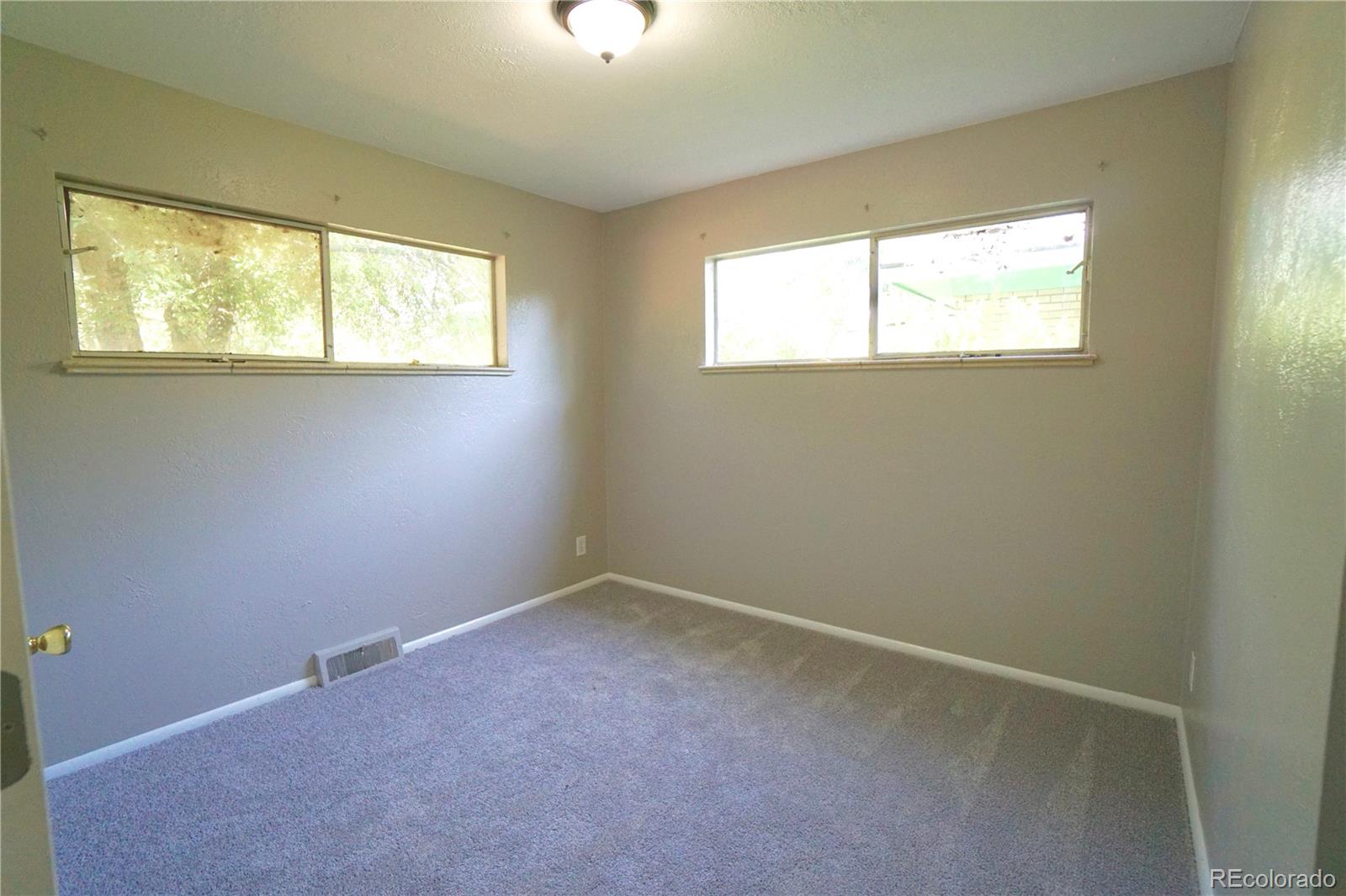 2519 15th Avenue Greeley, CO 80631 - Photo 18 of 25 an empty room with a window