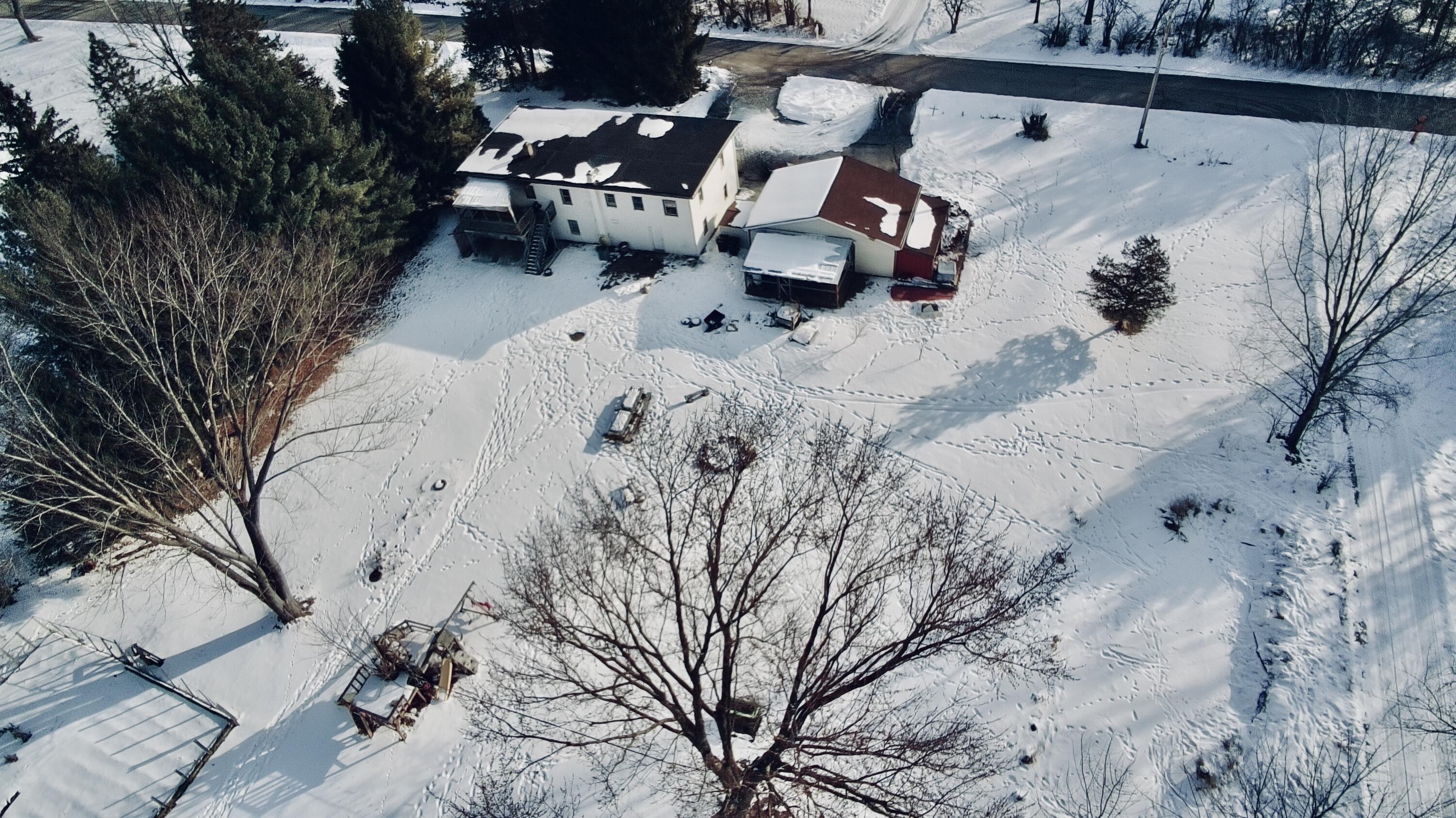 311 South Lapham Peak Road Delafield, WI 53018 - Photo 26 of 30 Drone Back View