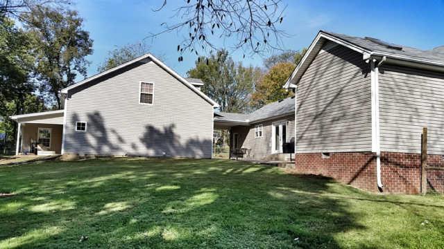 10755 Spanntown Road Arrington, TN 37014 - Photo 2 of 17 Great patio out back! Covered walk way to Detached Garage and Bonus Room!