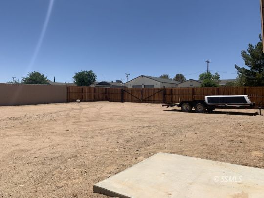 1320 Mayo Street Ridgecrest, CA 93555 - Photo 36 of 45 a view of swimming pool with a yard