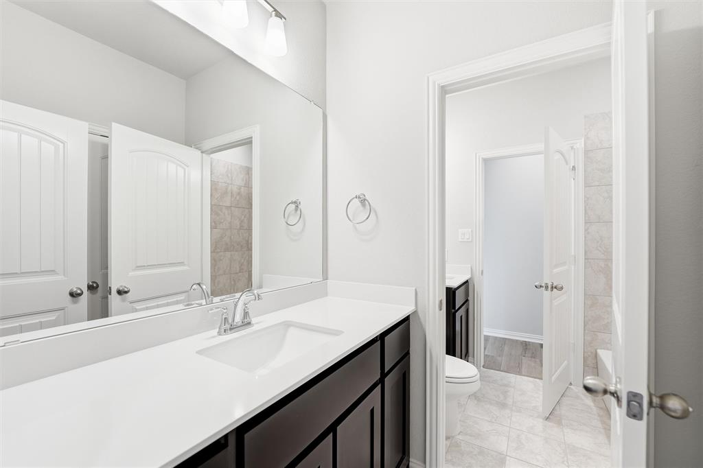 1244 Sabine River Lane Springtown, TX 76082 - Photo 18 of 26 Full bathroom featuring vanity and shower / washtub combination