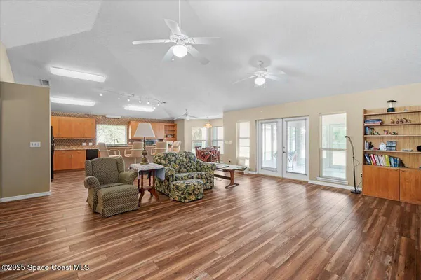 a view of a dining room with furniture window and outside view