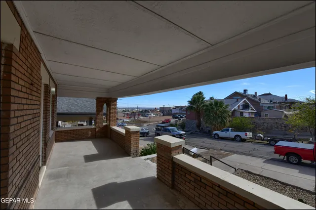 a view of cars parked on the roadside