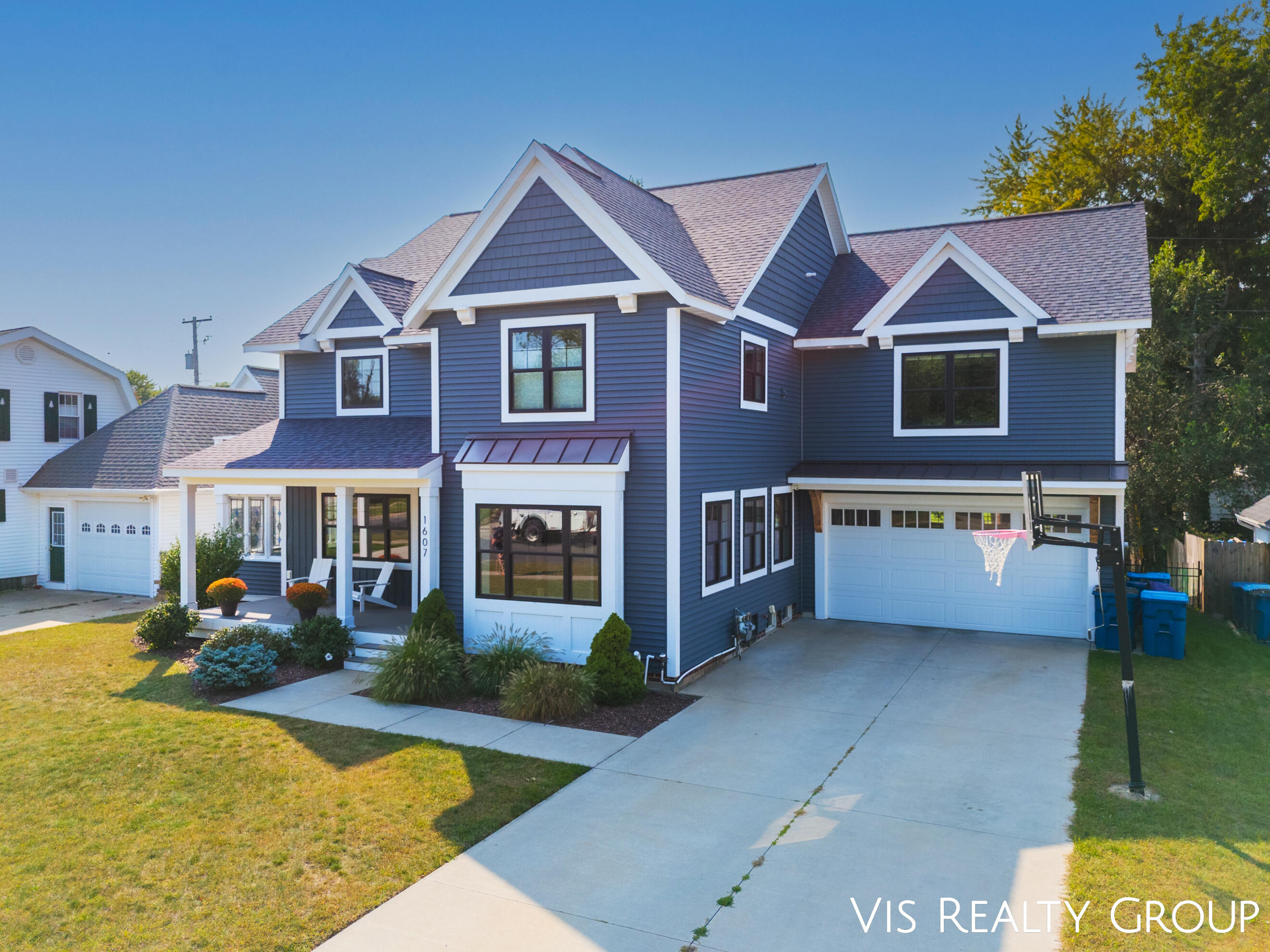 1607 Sheldon Road Grand Haven, MI 49417 - Photo 3 of 58 DJI_20240912155914_0311_D